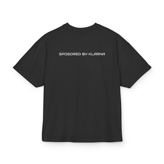 Black t-shirt with 'Sponsored by Klarna' text on the back against a white background, back