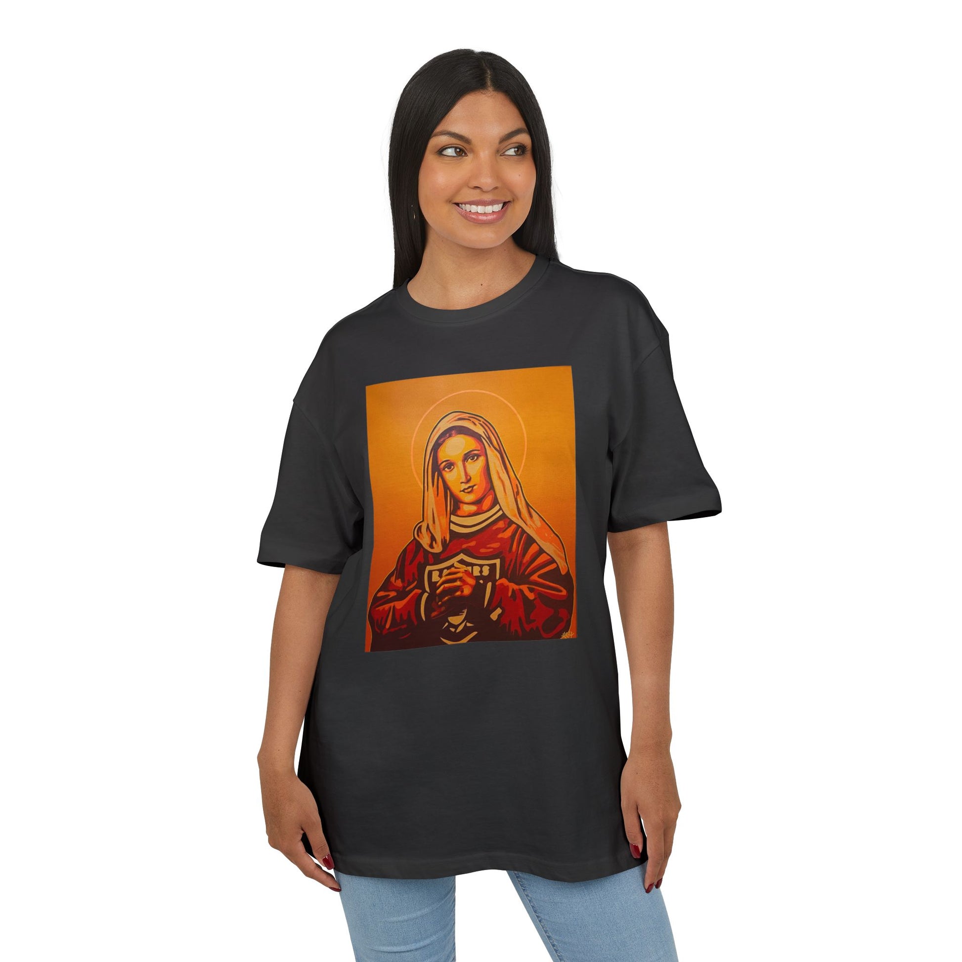 woman wearing black oversized t-shirt with a graphic artistic print of a person with a halo, front