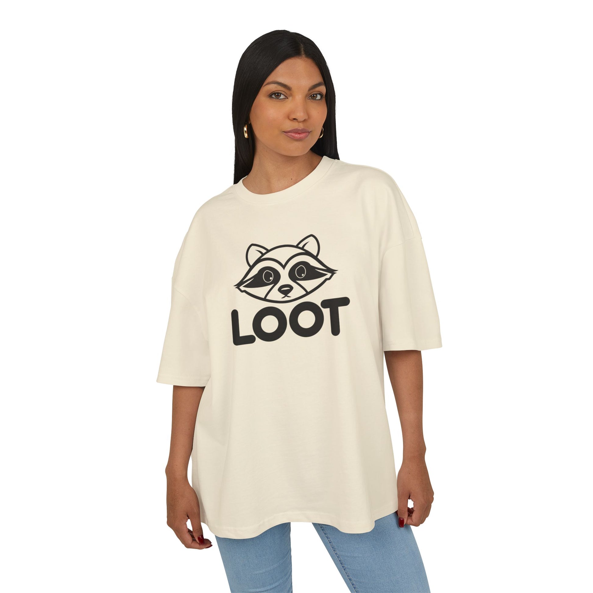 woman wearing Sand unisex box t-shirt with the word 'LOOT' printed on the front and a graphic of a raccoon's face, front