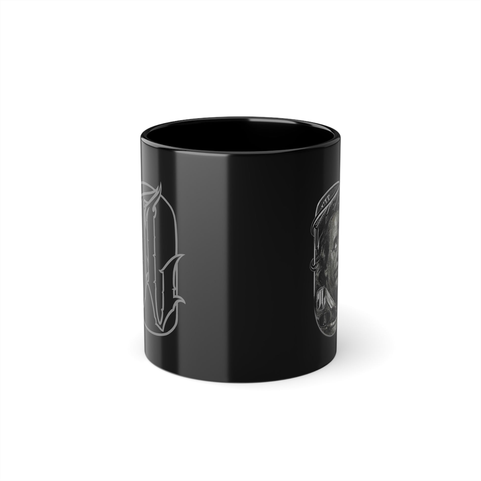A black ceramic coffee cup with a glossy finish and a handle on the left side, featuring a white graphic design both side, front