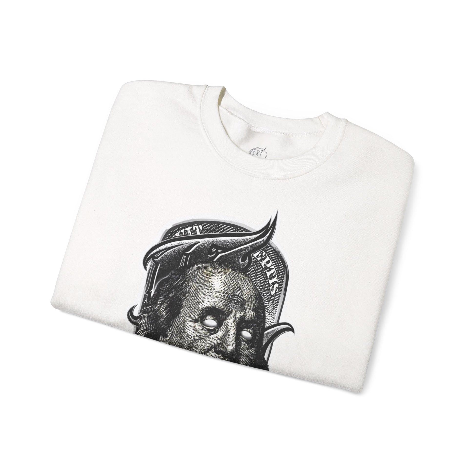 folded white sweatshirt with a graphic print of a character's face in black and white, front