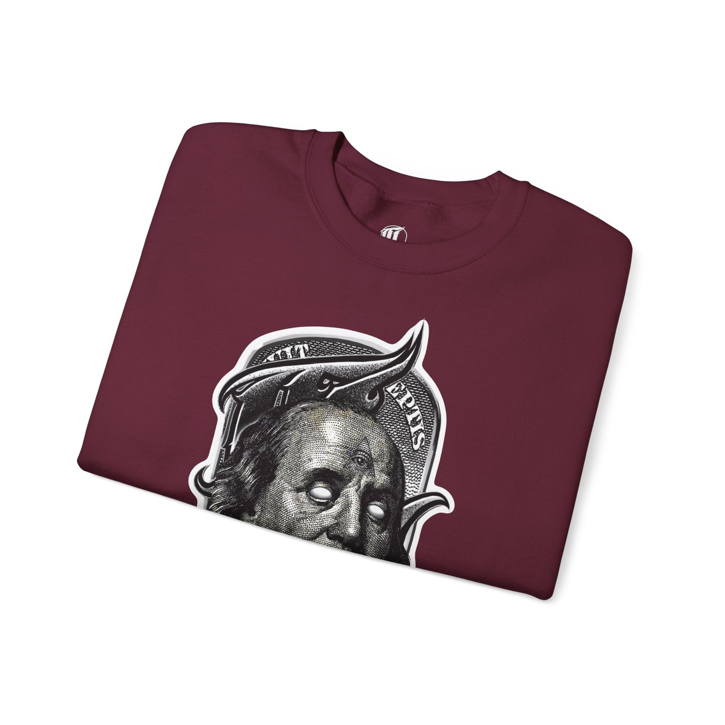 folded maroon sweatshirt with a graphic print of a character's face in black and white, front