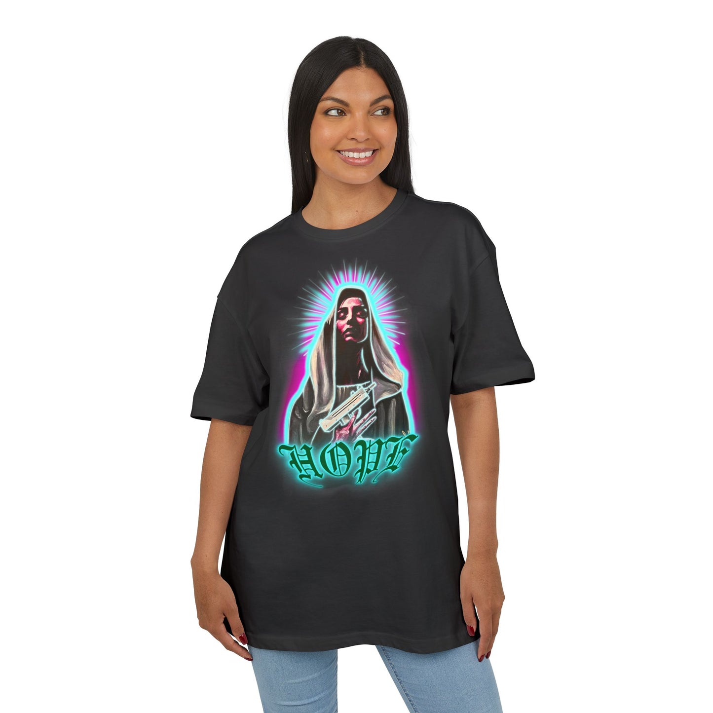 Woman wearing a black t-shirt with a graphic design on a white background, front