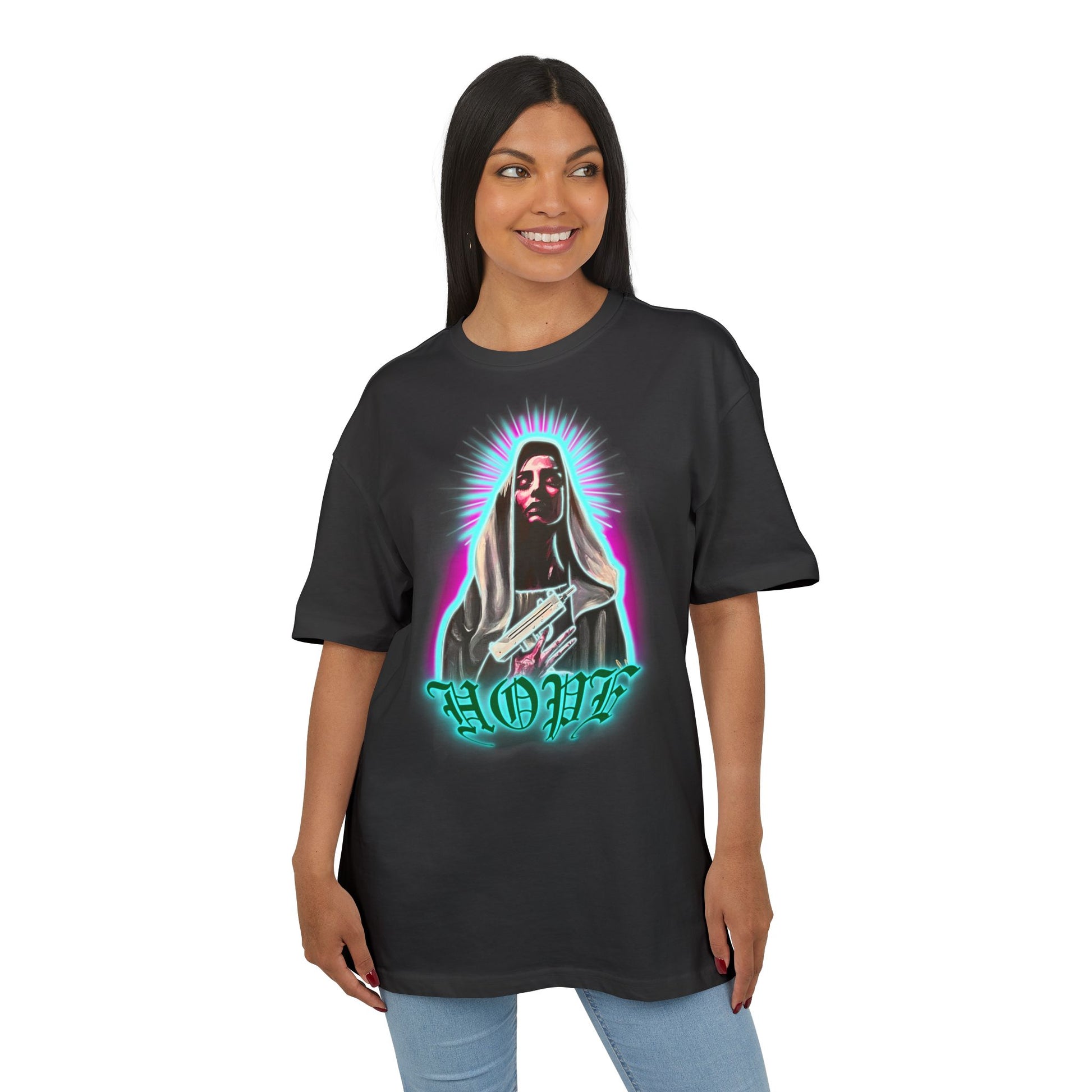 Woman wearing a black t-shirt with a graphic design on a white background, front