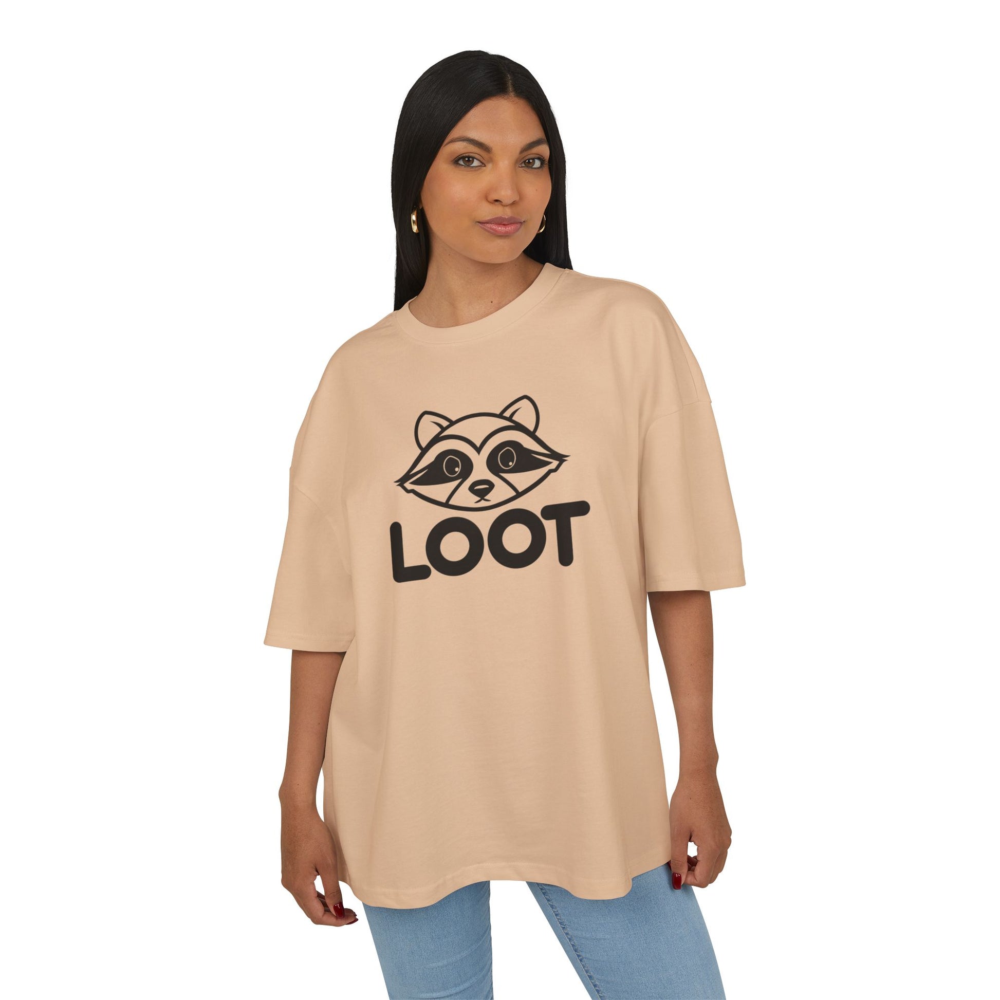 woman wearing union beige unisex box t-shirt with the word 'LOOT' printed on the front and a graphic of a raccoon's face, front