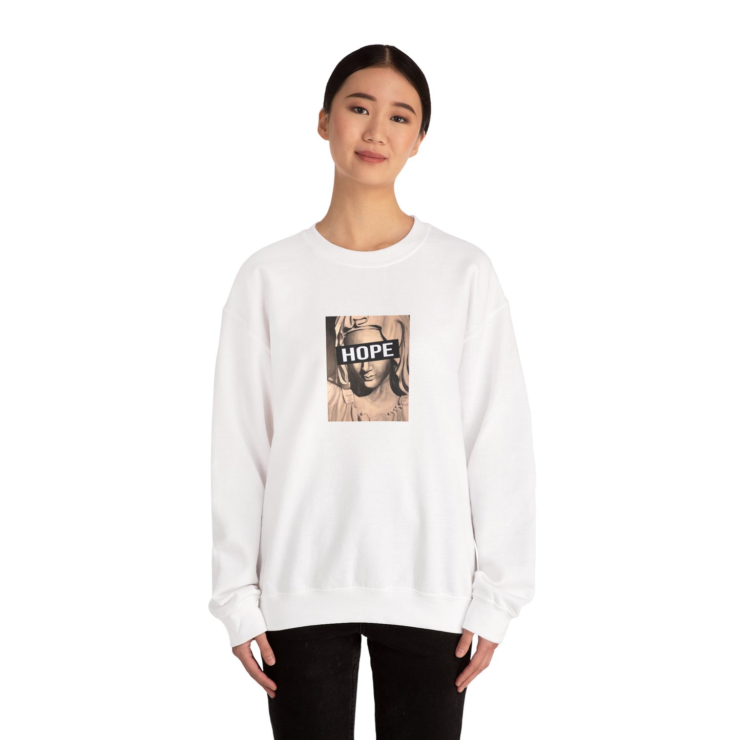 woman wearing white crewneck sweatshirt with a graphic print of a person's face and the word 'HOPE' on the front, front