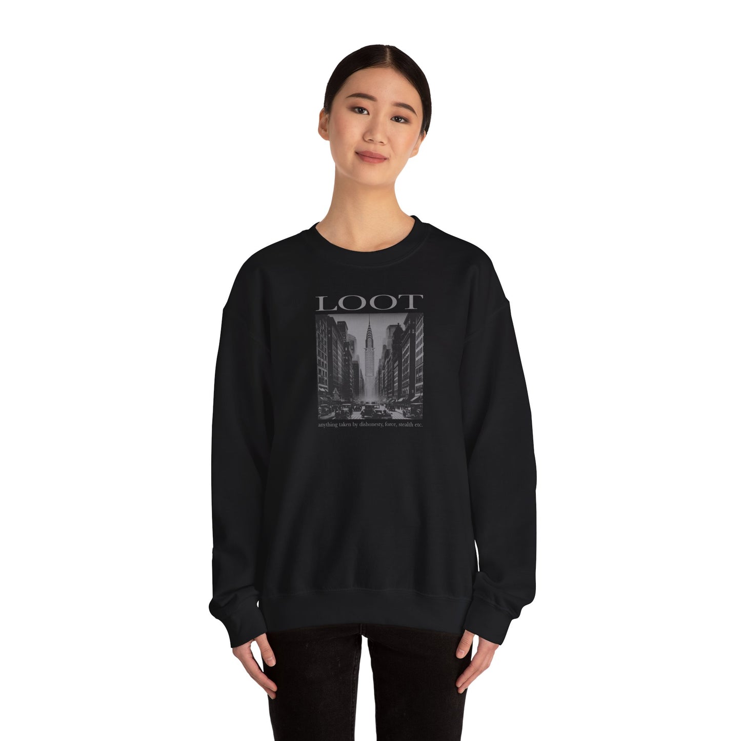 woman wearing black sweatshirt with black and white graphic and 'LOOT' text on a white background, front