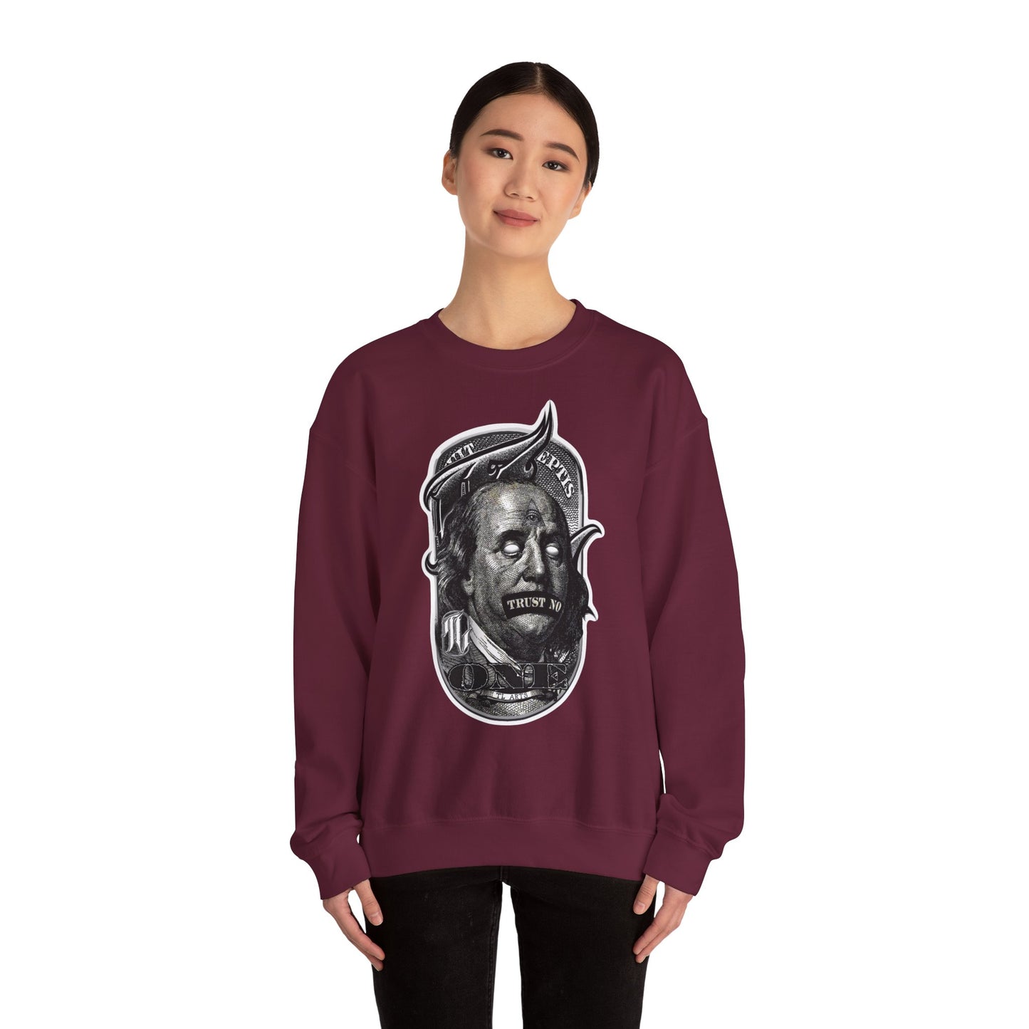 woman wearing maroon sweatshirt with a graphic print of a character's face in black and white, front