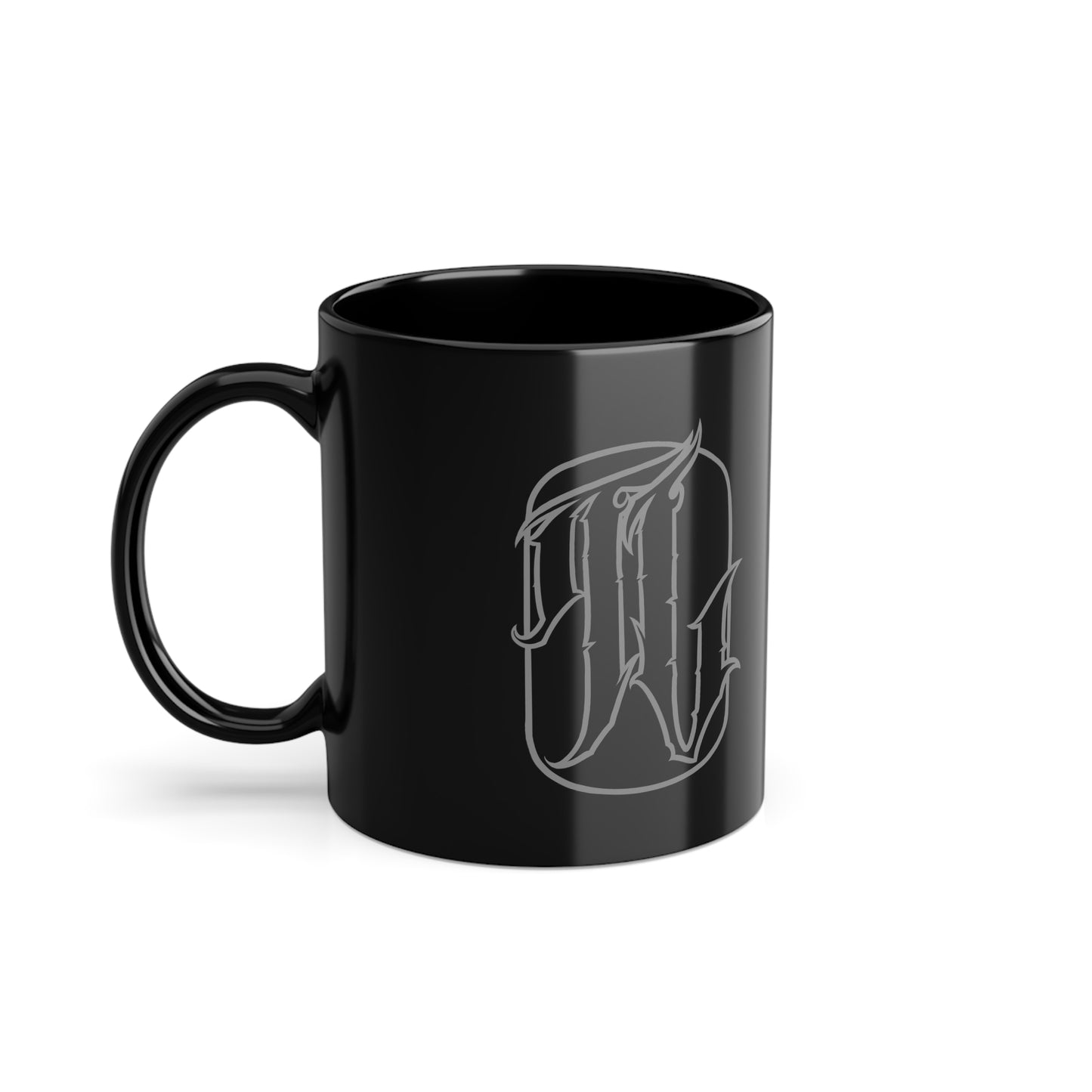 Black mug with white monogram on a white background, side